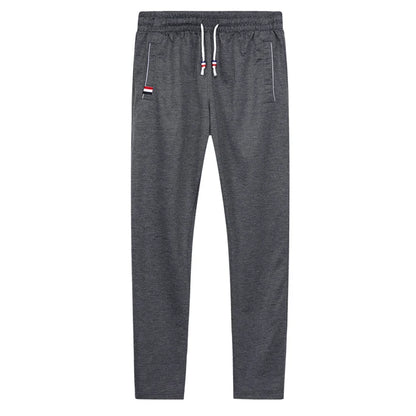 DIMUSI Mens Joggers Casual Pants Fitness Men Sportswear Tracksuit Bottoms Skinny Sweatpants Trousers Gyms Jogger Track Pants 6XL